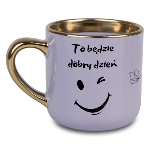 Fioletowy kubek z napisem To będzie dobry dzień i złotym uchem
