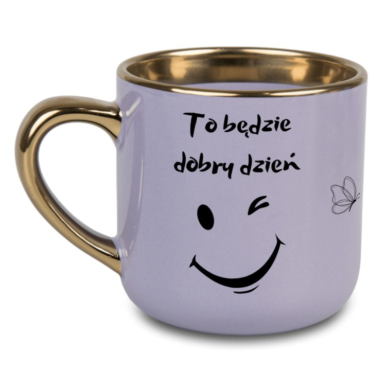 Fioletowy kubek z napisem To będzie dobry dzień i złotym uchem