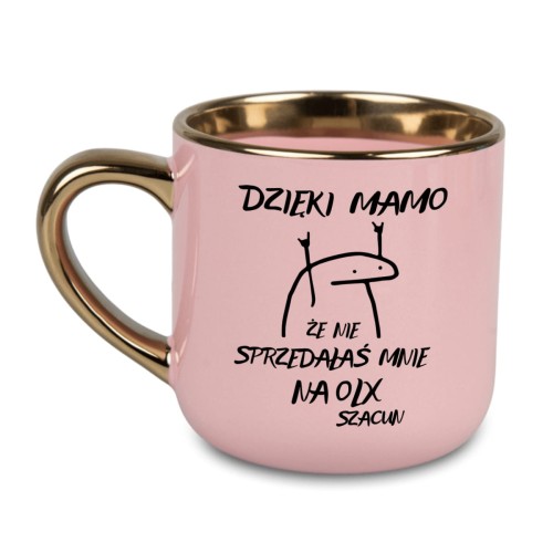 różowy kubek z napisem „Dzięki Mamo, że nie sprzedałaś mnie na OLX” i złotym uchem