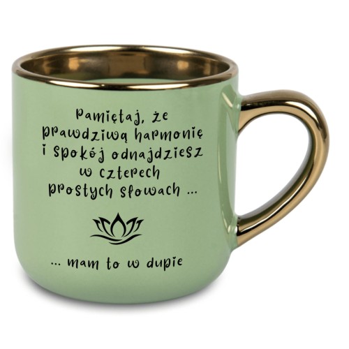 zielony kubek ze złotym uchem z napisem prawdziwa harmonia i spokoj odnajdziesz w czterech prostych słowach