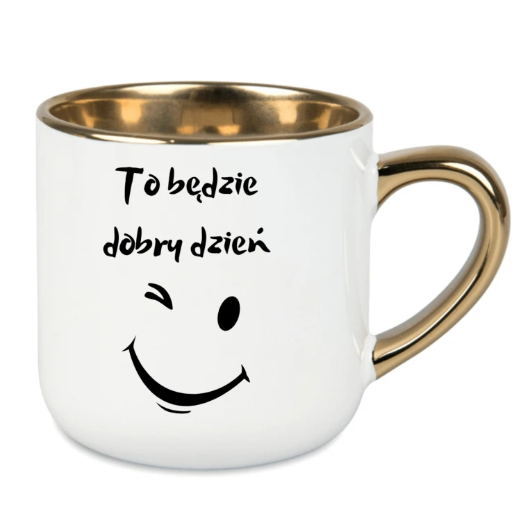 Śnieżnobiały kubek ze złotym uchem i pozytywnym hasłem na dobry dzień