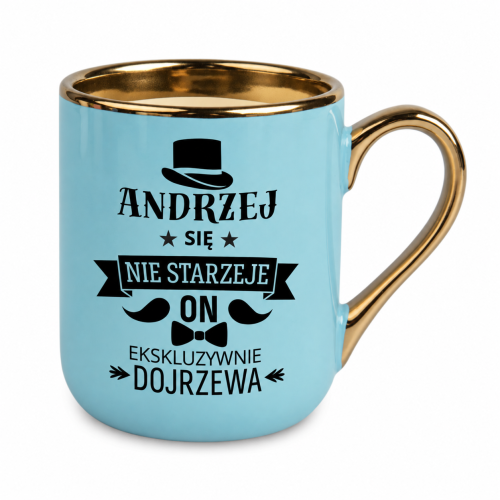 Jasnoniebieski kubek Elegant 330 ml ze złotym uchem i czarną grafiką cylindra, wąsów oraz muchy